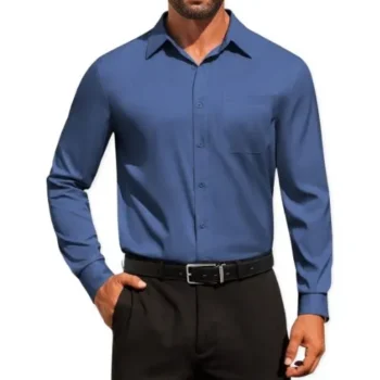 A man wearing a solid blue formal shirt with long sleeves, wrinkle-free fabric, and a chest pocket, paired with black pants.